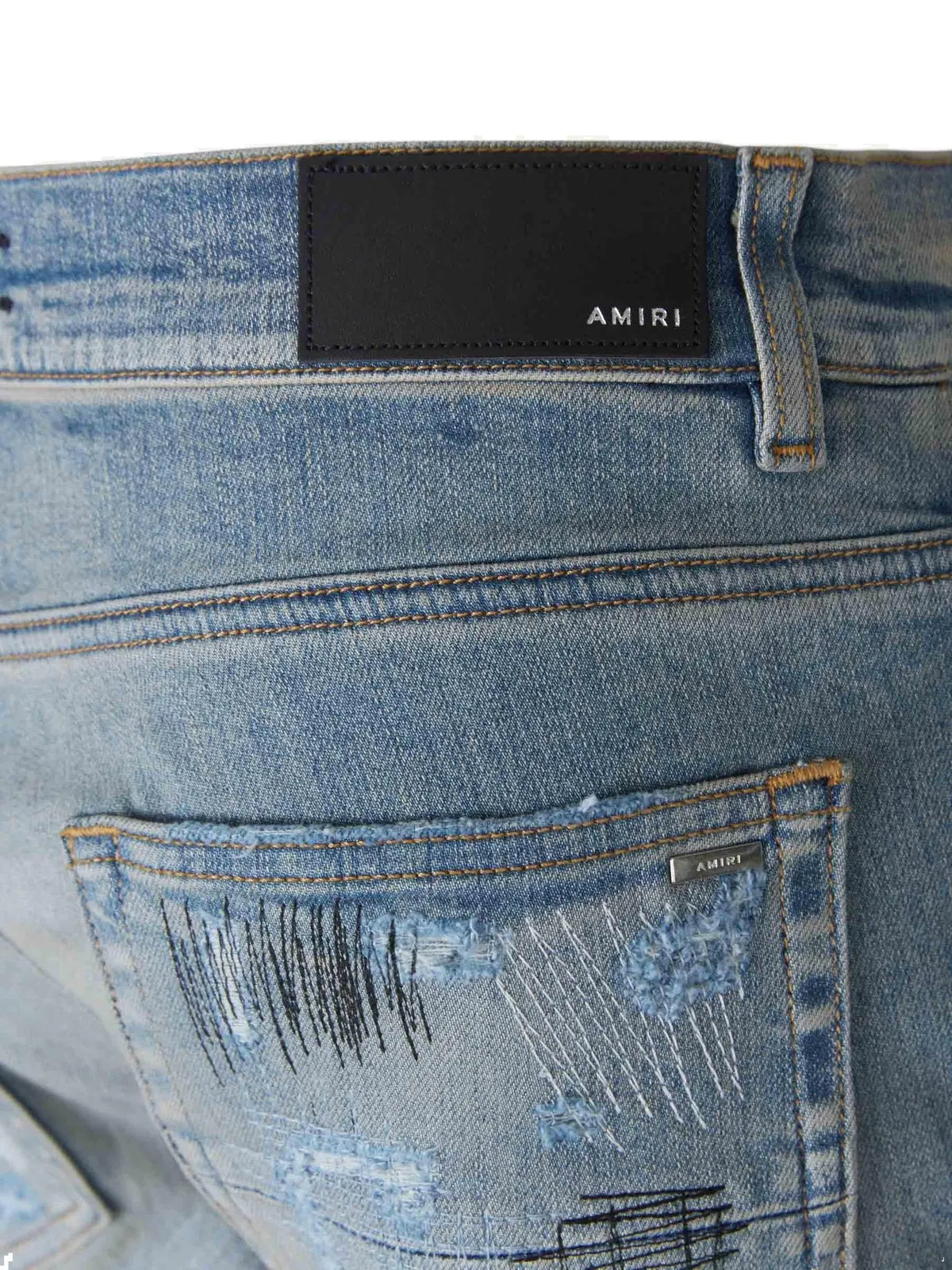 Amiri Amiri Distressed Mid-Rise Jeans