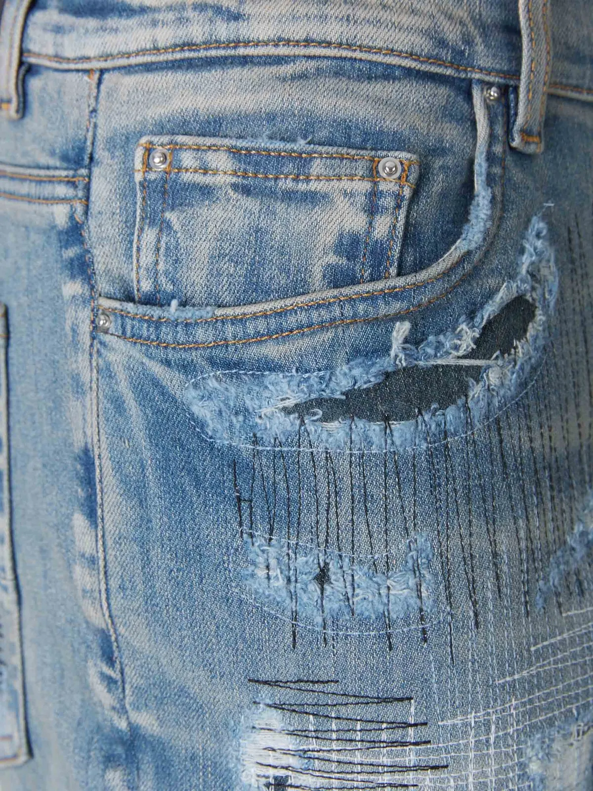 Amiri Amiri Distressed Mid-Rise Jeans