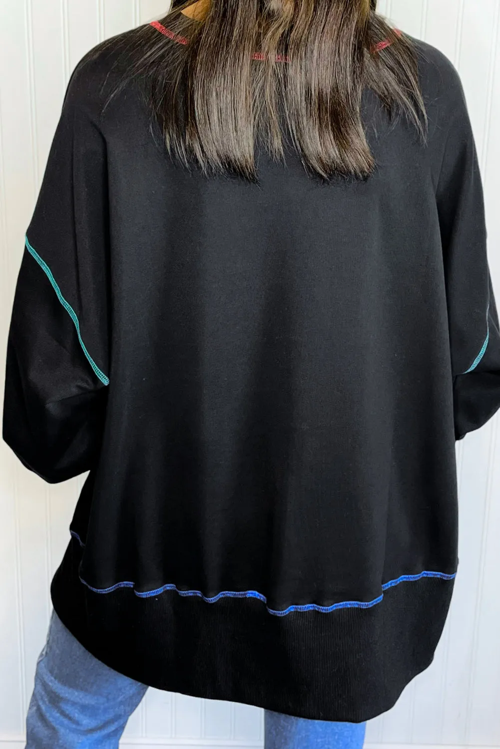 Black Sequin Clover Exposed Seam Split Lantern Sleeve Sweatshirt