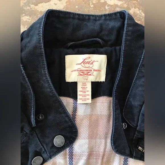 Levi’s | Women’s black canvas bomber jacket, plaid lined, cinched waist, size S
