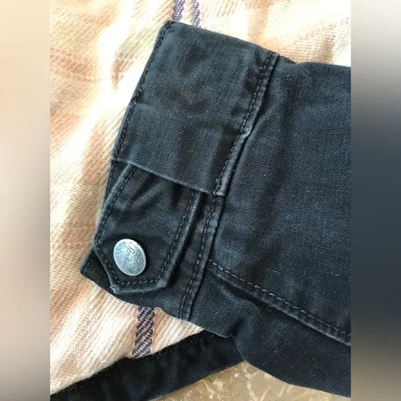 Levi’s | Women’s black canvas bomber jacket, plaid lined, cinched waist, size S