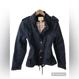 Levi’s | Women’s black canvas bomber jacket, plaid lined, cinched waist, size S