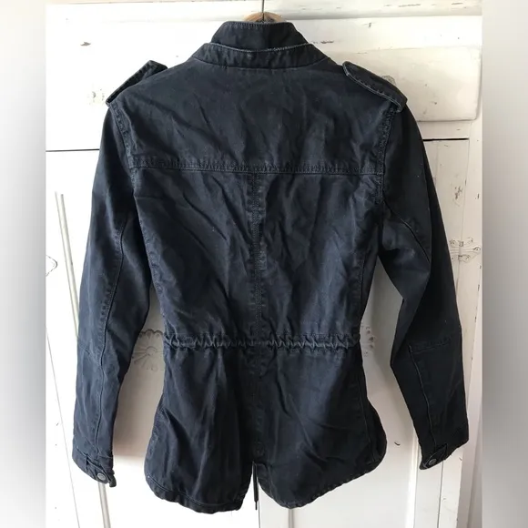 Levi’s | Women’s black canvas bomber jacket, plaid lined, cinched waist, size S