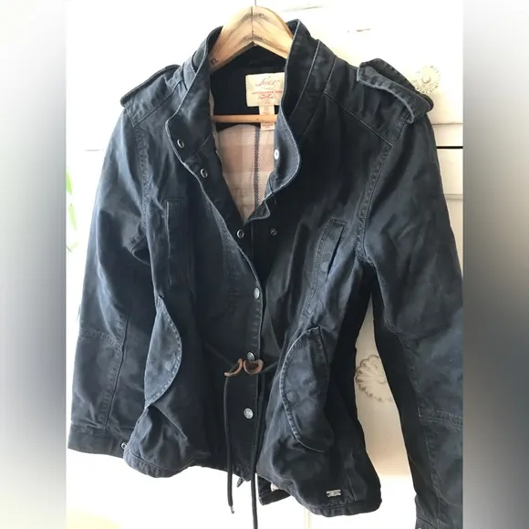 Levi’s | Women’s black canvas bomber jacket, plaid lined, cinched waist, size S