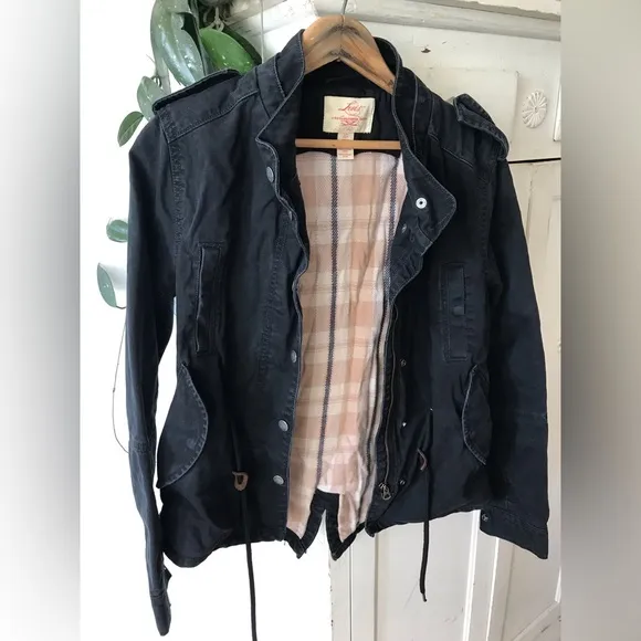 Levi’s | Women’s black canvas bomber jacket, plaid lined, cinched waist, size S