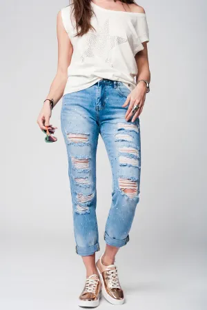 Mom jeans with extreme rips