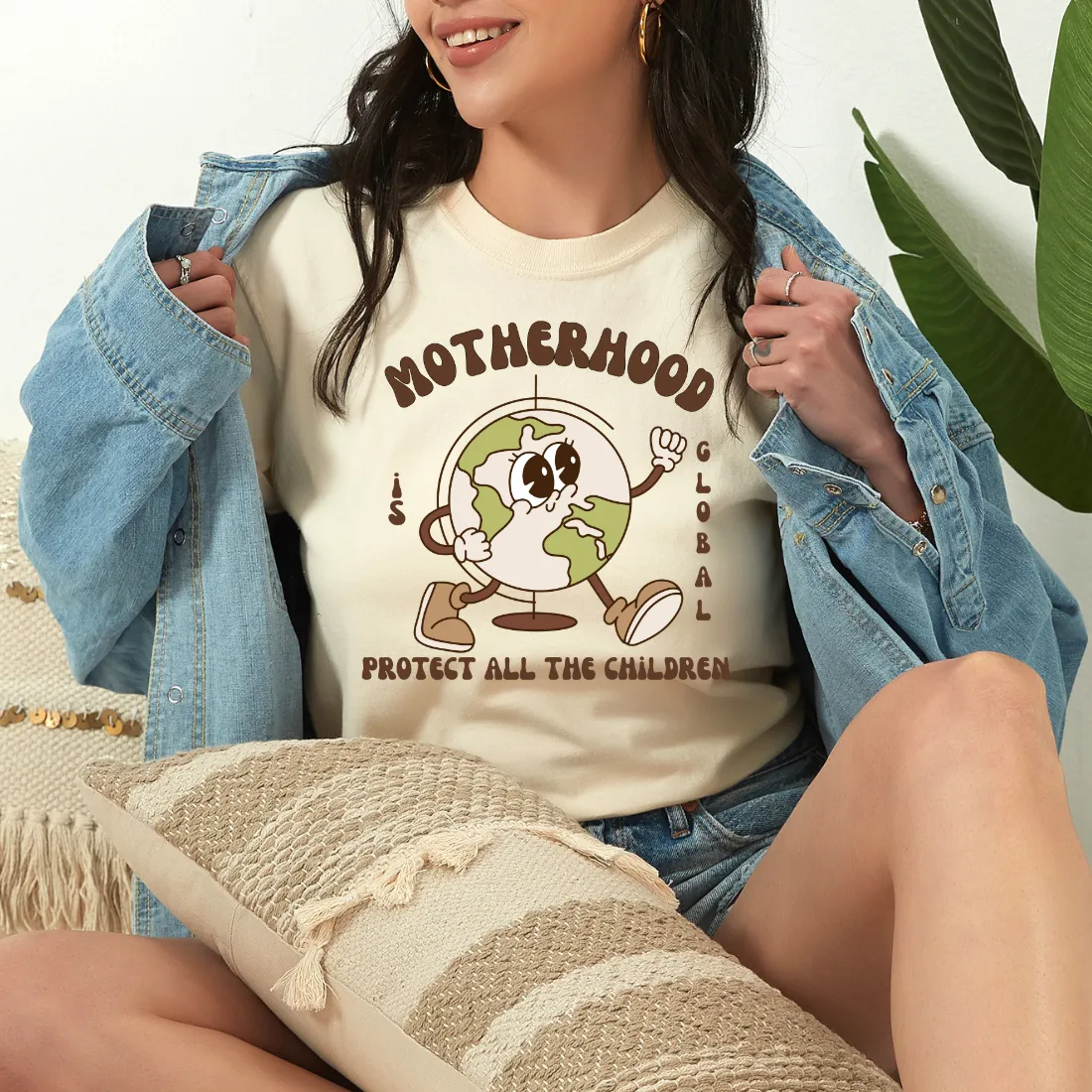 Motherhood is Global Unisex T-shirt
