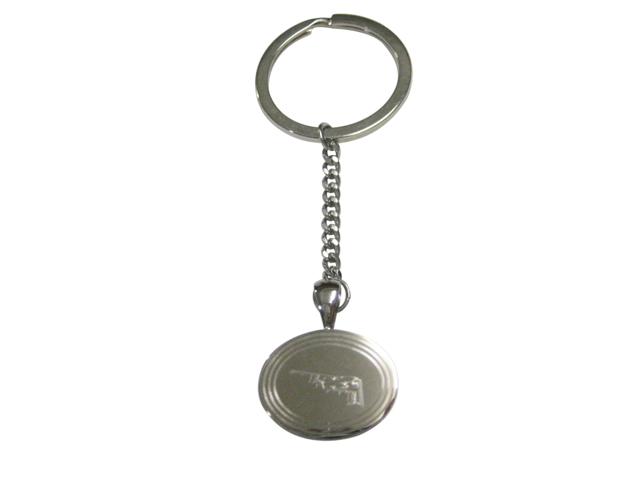 Silver Toned Etched Oval Stealth Bomber Plane Pendant Keychain