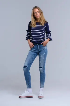 Skinny jeans with rips