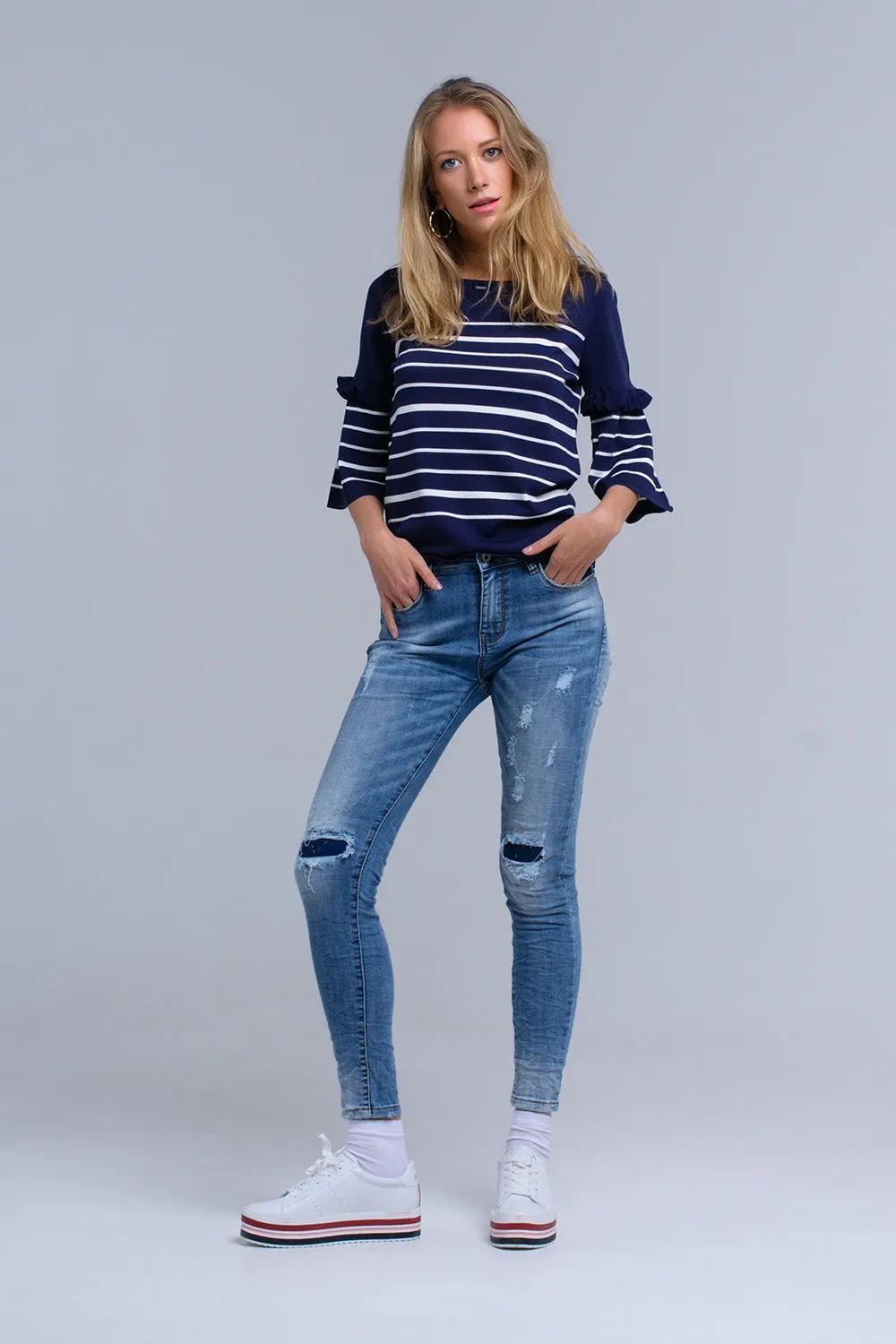 Skinny jeans with rips