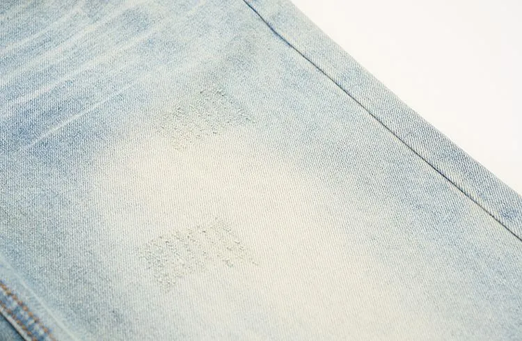 Stylish Faded Straight Leg Jeans with a Distressed Finish